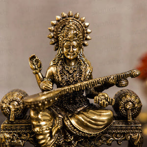 Brass Saraswati Idol Playing Veena On Singhasan